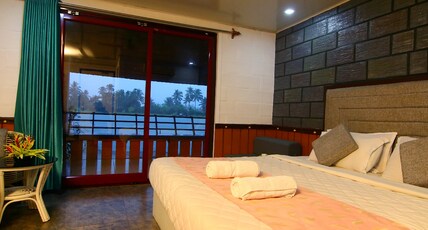 Green Palace Ayurveda Resort Room Type - Premium Lake View Cottage Green Palace Ayurveda Resort Room Type - Premium Lake View Cottage