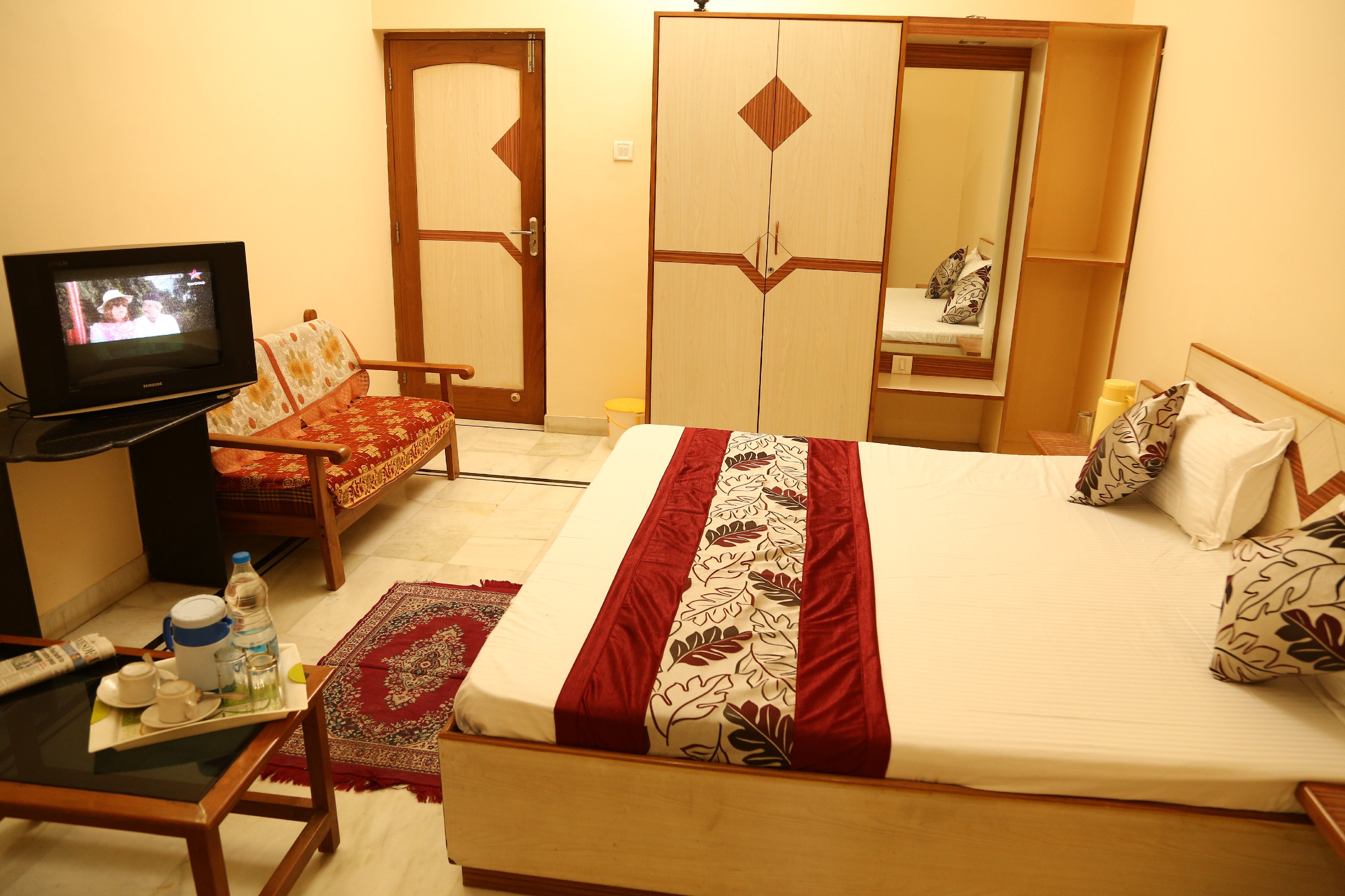 Hotel Ambika - Tap to explore photos