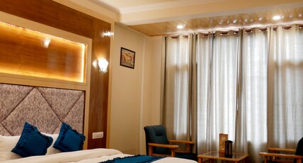 New Ambika International Mall Road Hotel Room Type - Super Deluxe Room with Balcony New Ambika International Mall Road Hotel Room Type - Super Deluxe Room with Balcony