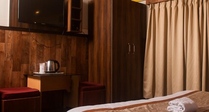 Samrat Residency Room Type - Deluxe Room
