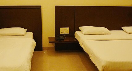 Hotel Sai Smaran Room Type - Standard Triple Bed Non A.C
