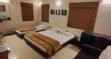 Hotel Harmony, Junagadh Room Type - Deluxe Three Bed Room