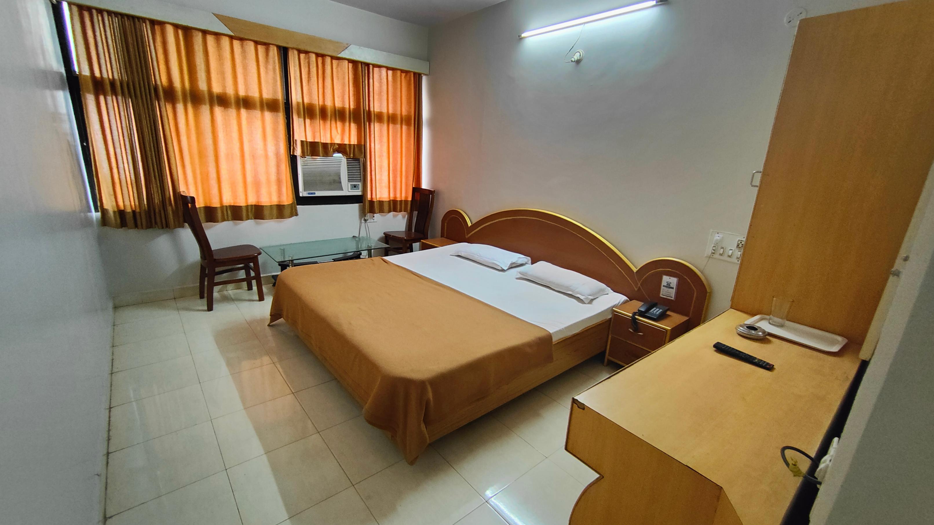 Hotel Rajdev - Tap to explore photos