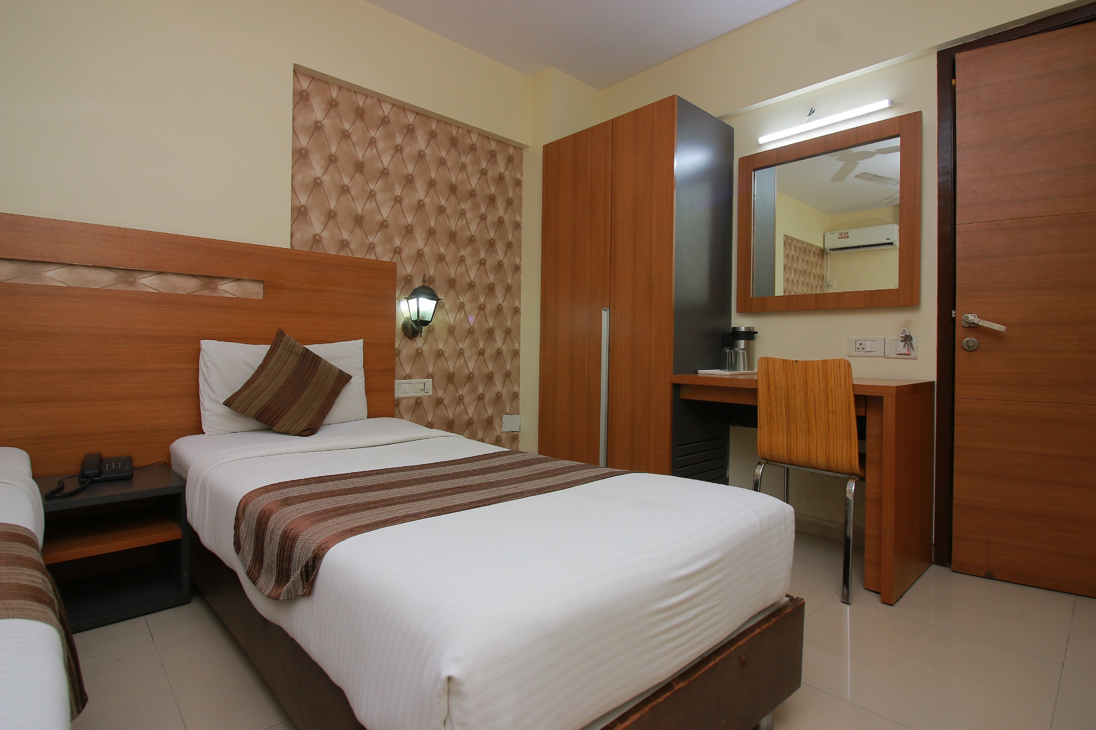 Hotel Tanish Residency - Tap to explore photos