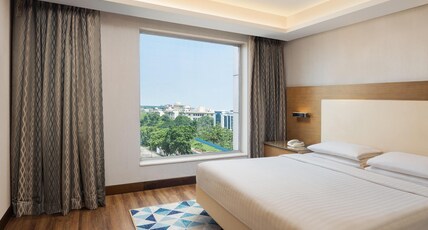 Courtyard by Marriott Bhopal Room Type - Courtyard Suite, 1 Bedroom, Executive Lounge Access, Bathtub, 2 Pieces Laundry Per Day, 2-way Airpor Courtyard by Marriott Bhopal Room Type - Courtyard Suite, 1 Bedroom, Executive Lounge Access, Bathtub, 2 Pieces Laundry Per Day, 2-way Airpor