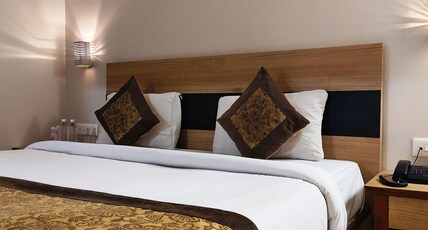 Hotel Simran (Raipur Junction) Room Type - Standard Double (King Bed) Hotel Simran (Raipur Junction) Room Type - Standard Double (King Bed)