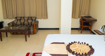 Hotel Simran (Raipur Junction) Room Type - Studio Club Double (King Bed) Hotel Simran (Raipur Junction) Room Type - Studio Club Double (King Bed)