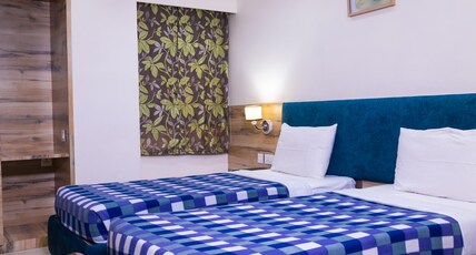 Hotel Sagar (Pure Veg) Room Type - Standard Deluxe Room (AC) with Free WiFi