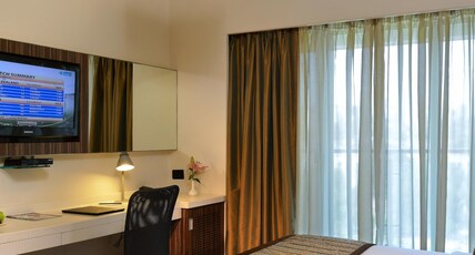 Residency Sarovar Portico Room Type - Superior Room - Queen Bed