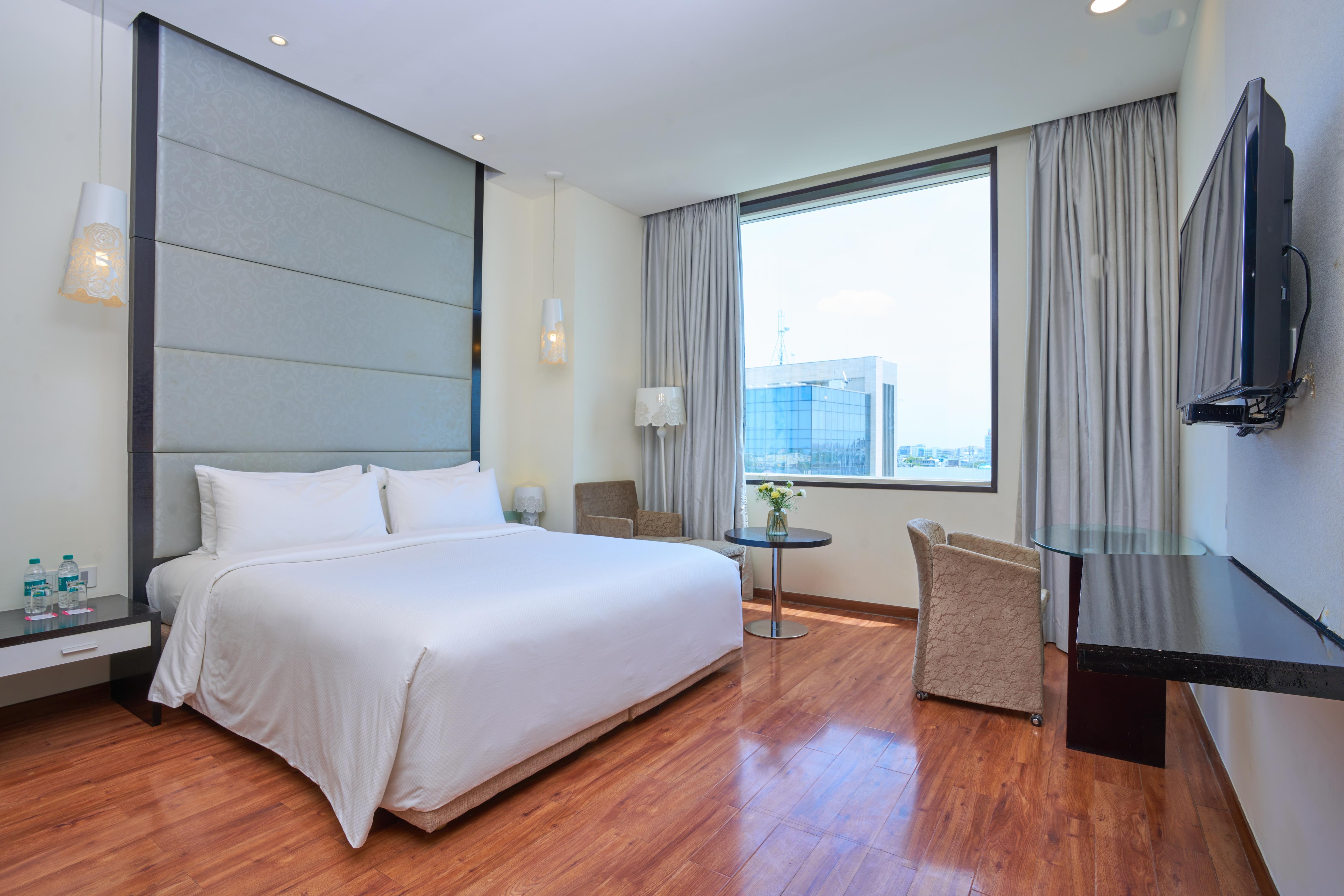 E Hotel - Tap to explore photos