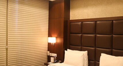 Jasmine Boutique Hotel Jasola Room Type - Deluxe Room.