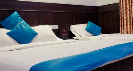 The Signature Inn Room Type - Deluxe Triple Bed Non AC Room
