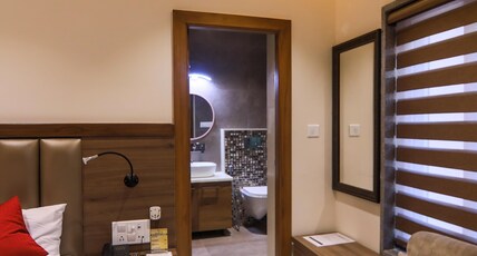 Vashishth Guest House (Behind Parmarth Niketan) Room Type - Single Deluxe Room