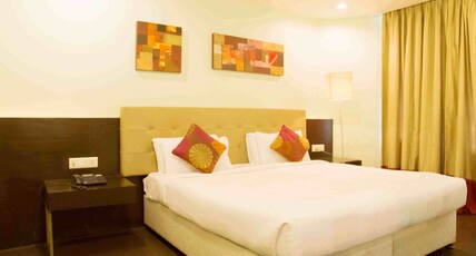 Hotel Urvasi Room Type - Deluxe Room