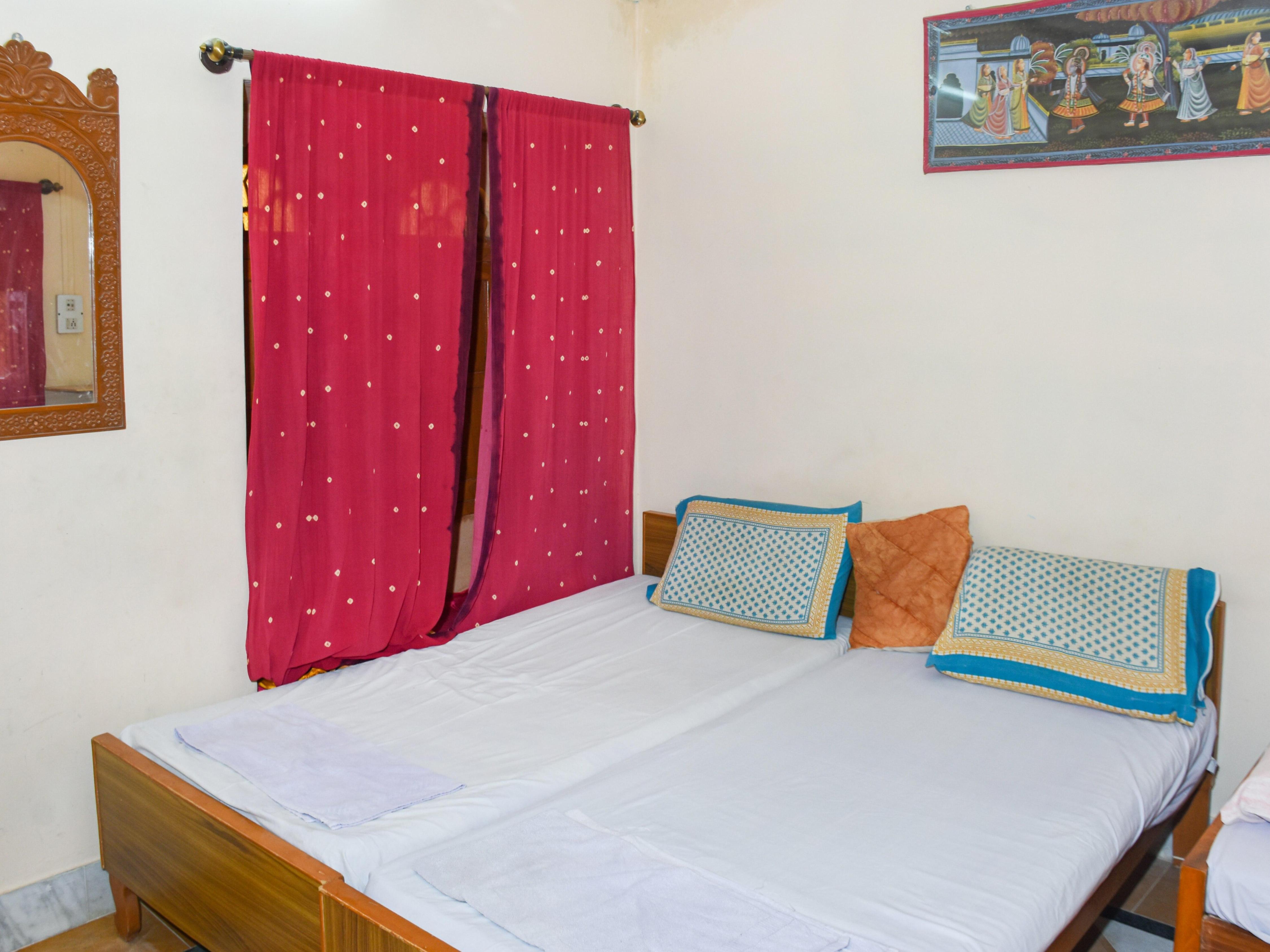 Ganesh Guest House Room Type - Deluxe Triple Bed Room