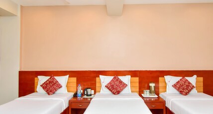 Pleasant Inn Room Type - Triple Bed AC