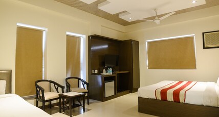 Hotel Karan Villas Room Type - Large Triple Room with 1 King and 1 Single Bed Hotel Karan Villas Room Type - Large Triple Room with 1 King and 1 Single Bed