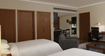 Hilton Bangalore Embassy GolfLinks Room Type - Twin Hilton Guestroom With Kitchenette and Bathtub Hilton Bangalore Embassy GolfLinks Room Type - Twin Hilton Guestroom With Kitchenette and Bathtub