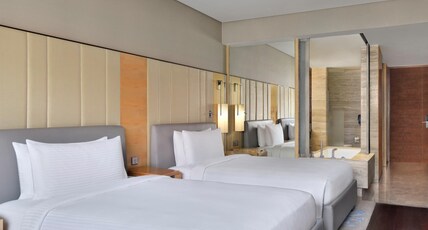 JW Marriott Hotel New Delhi Aerocity Room Type - Deluxe Twin with Bathtub & Seating Area JW Marriott Hotel New Delhi Aerocity Room Type - Deluxe Twin with Bathtub & Seating Area