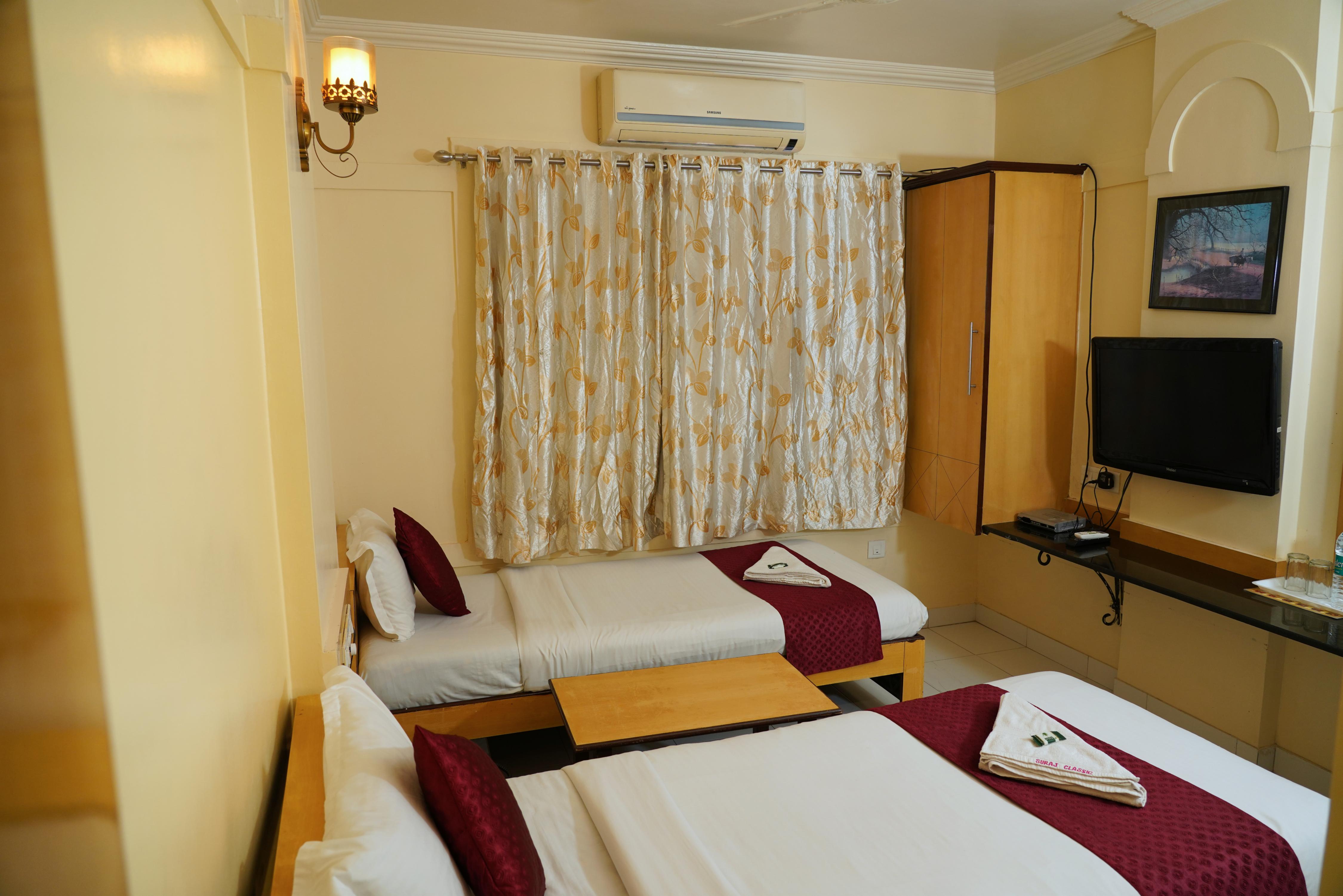 Hotel Suraj Classic - Tap to explore photos