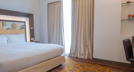 Novotel Pune, Nagar Road Room Type - Junior King Suite with Bathtub, 2 way airport transfers & Happy Hours Novotel Pune, Nagar Road Room Type - Junior King Suite with Bathtub, 2 way airport transfers & Happy Hours