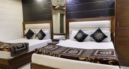 HOTEL ROMA DELUXE TWO MINUTES DISTANCE FROM NEW DELHI RAILWAY STATION Room Type - Executive Family Room