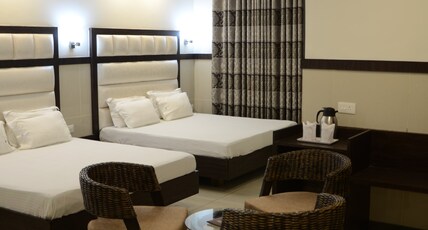 Hotel satyam @Jammu Tawi Railway station Room Type - Family Four Bedded Room