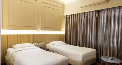 Grand Kalinga Hotel Room Type - Dlx Double orTwin Bed AC Room