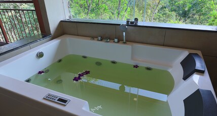 Petals Resorts Wayanad Room Type - Royal Private Jacuzzi Ac Room with Private Balcony Petals Resorts Wayanad Room Type - Royal Private Jacuzzi Ac Room with Private Balcony