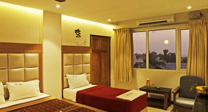 New Cape Hotel Room Type - Deluxe Triple AC Room