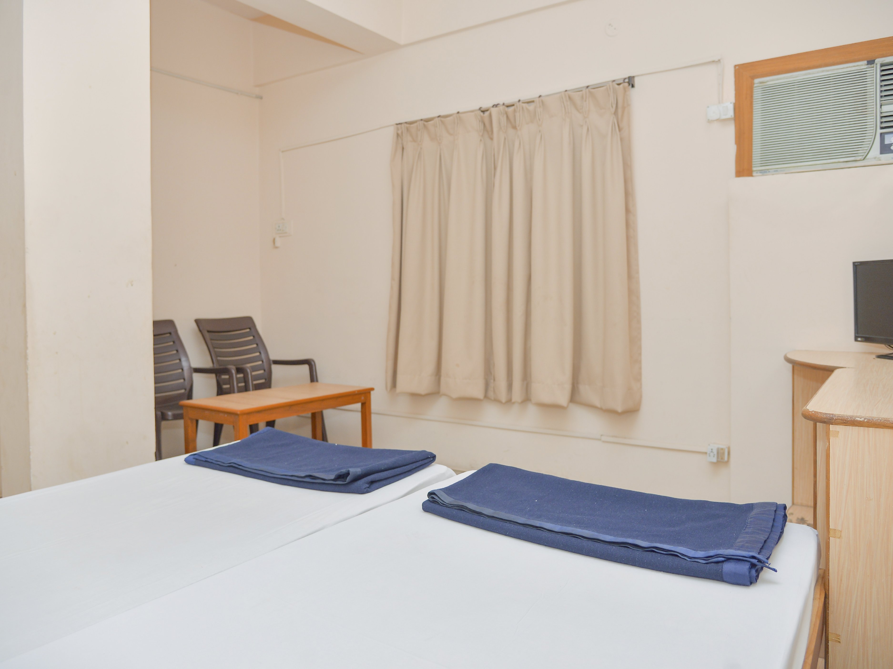 Hotel Megha City - Tap to explore photos