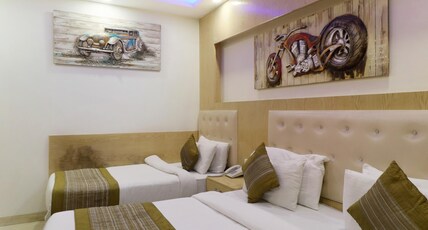 Hotel Prince Palace Deluxe Room Type - Deluxe Triple Room with AC Complimentary Wi-Fi Hotel Prince Palace Deluxe Room Type - Deluxe Triple Room with AC Complimentary Wi-Fi