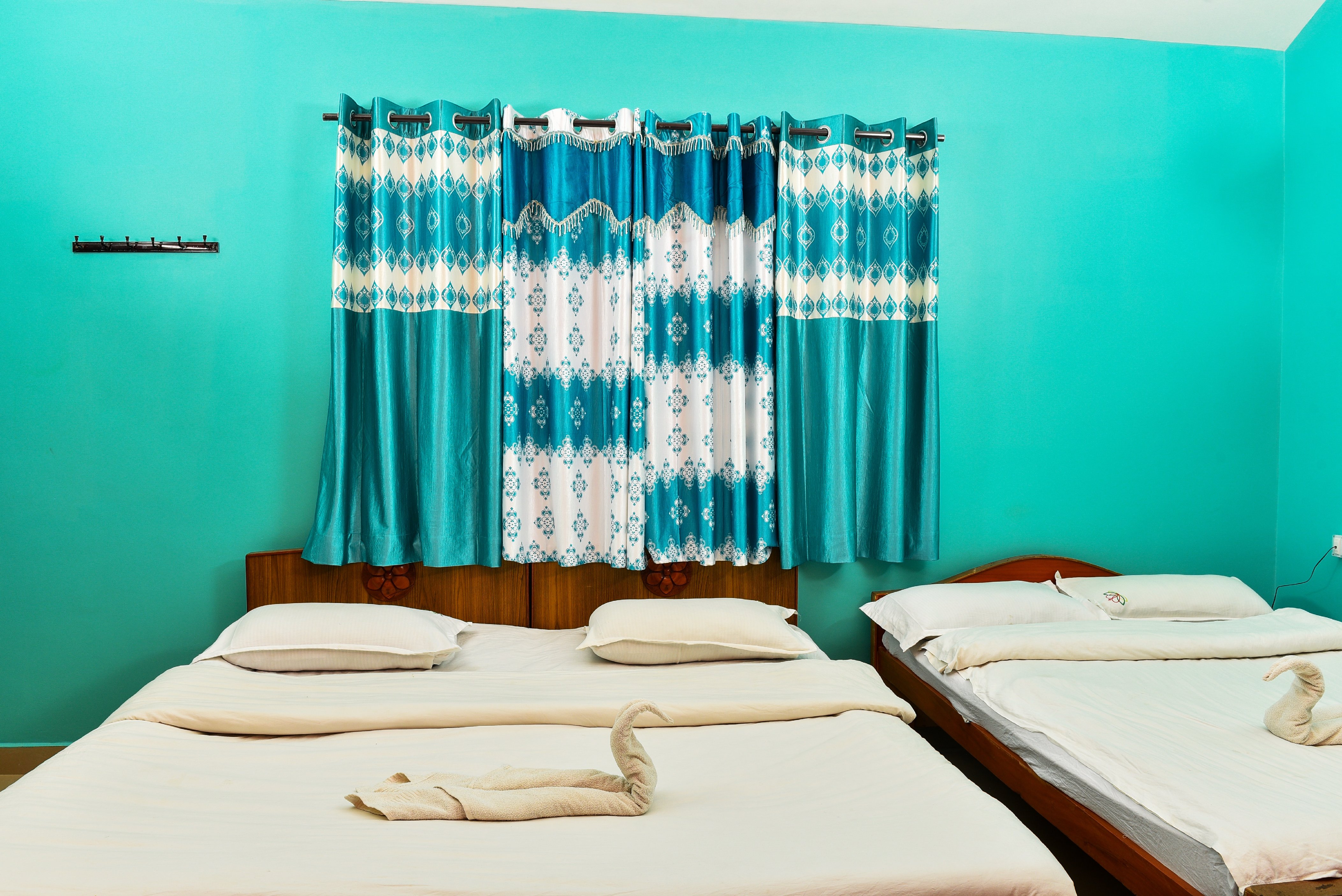 RK Homes Guest House Room Type - Standard Family Room - Four Bedded