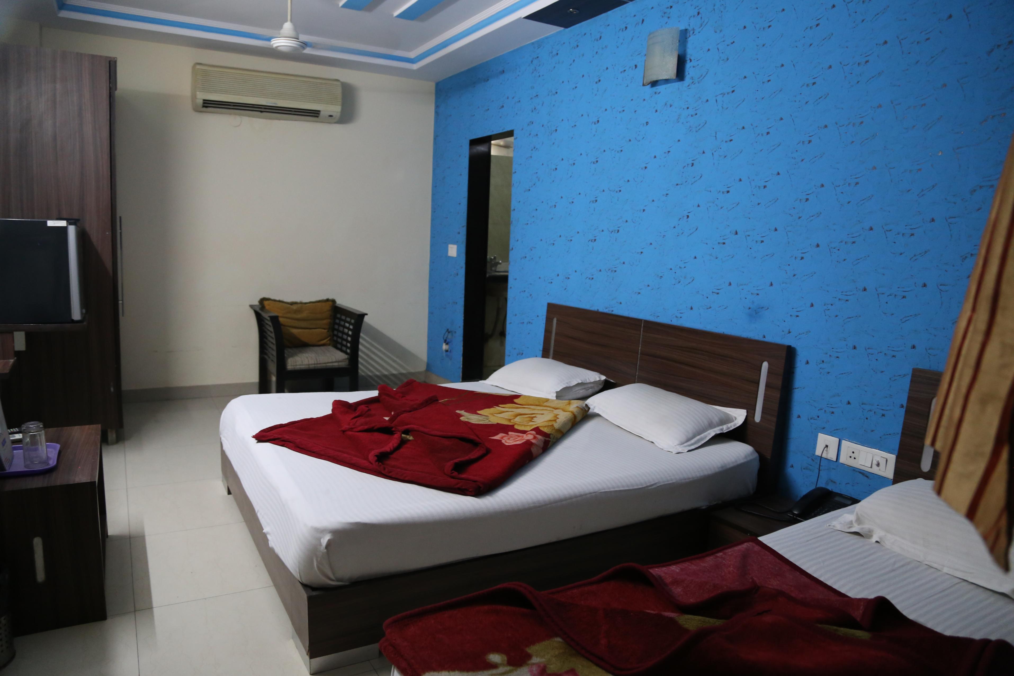 DURGA INTERNATIONAL DELUXE Room Type - Deluxe Room with Free Wi-Fi