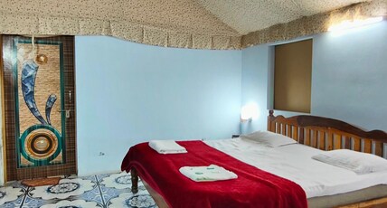 HOTEL PALMS Room Type - SWISS AC DELUXE TENT (POOL SIDE)