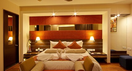Saravana's Golden Fruits Business Suites Room Type - Deluxe Room