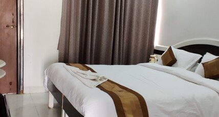 Hotel Radhika Palace (Pure Veg) Room Type - Deluxe NON AC Room