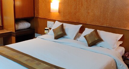 Hotel Radhika Palace (Pure Veg) Room Type - Deluxe AC
