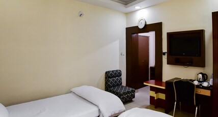 Hotel Om International Room Type - Deluxe  Room