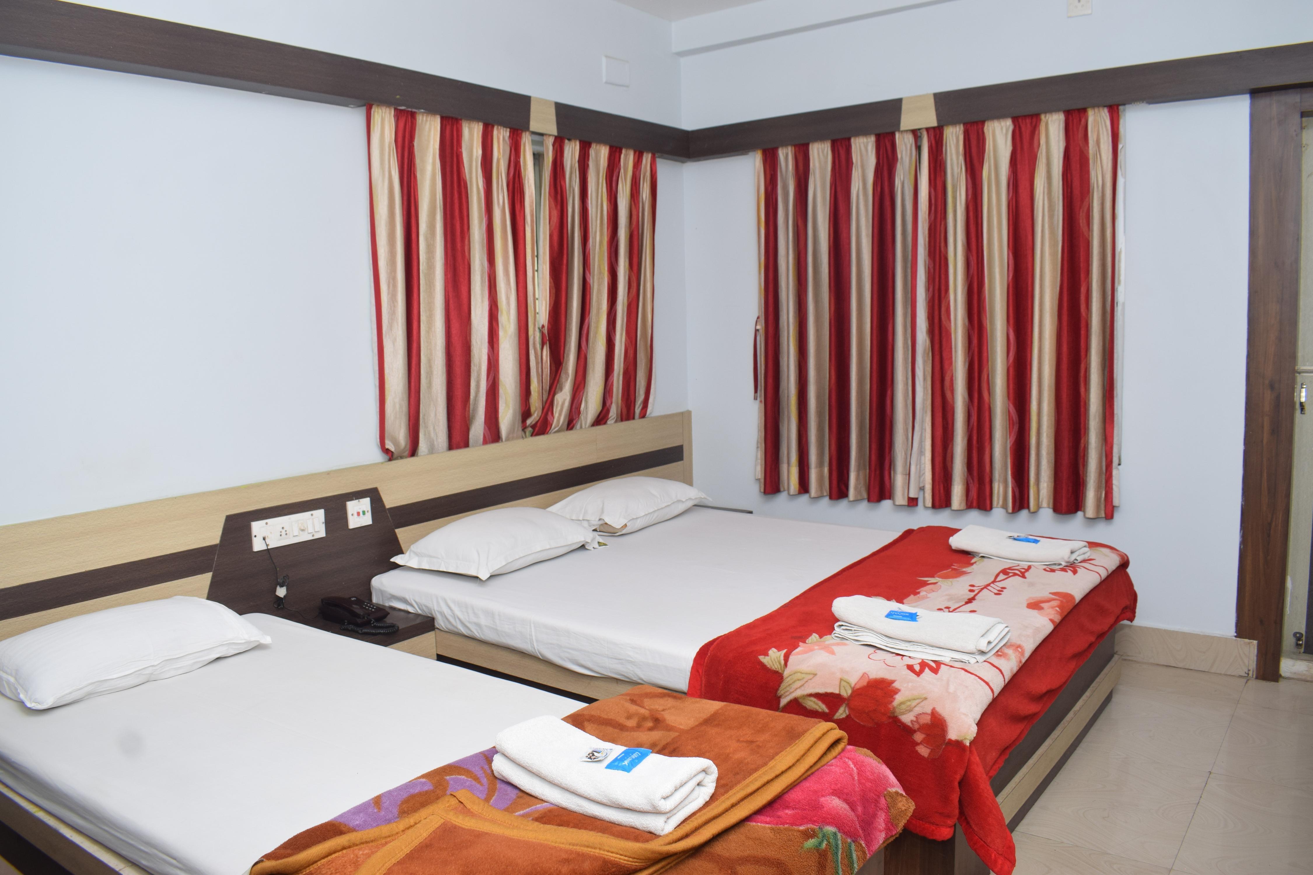 HOTEL SRIKRISHNA INTERNATIONAL Room Type - AC Triple Deluxe