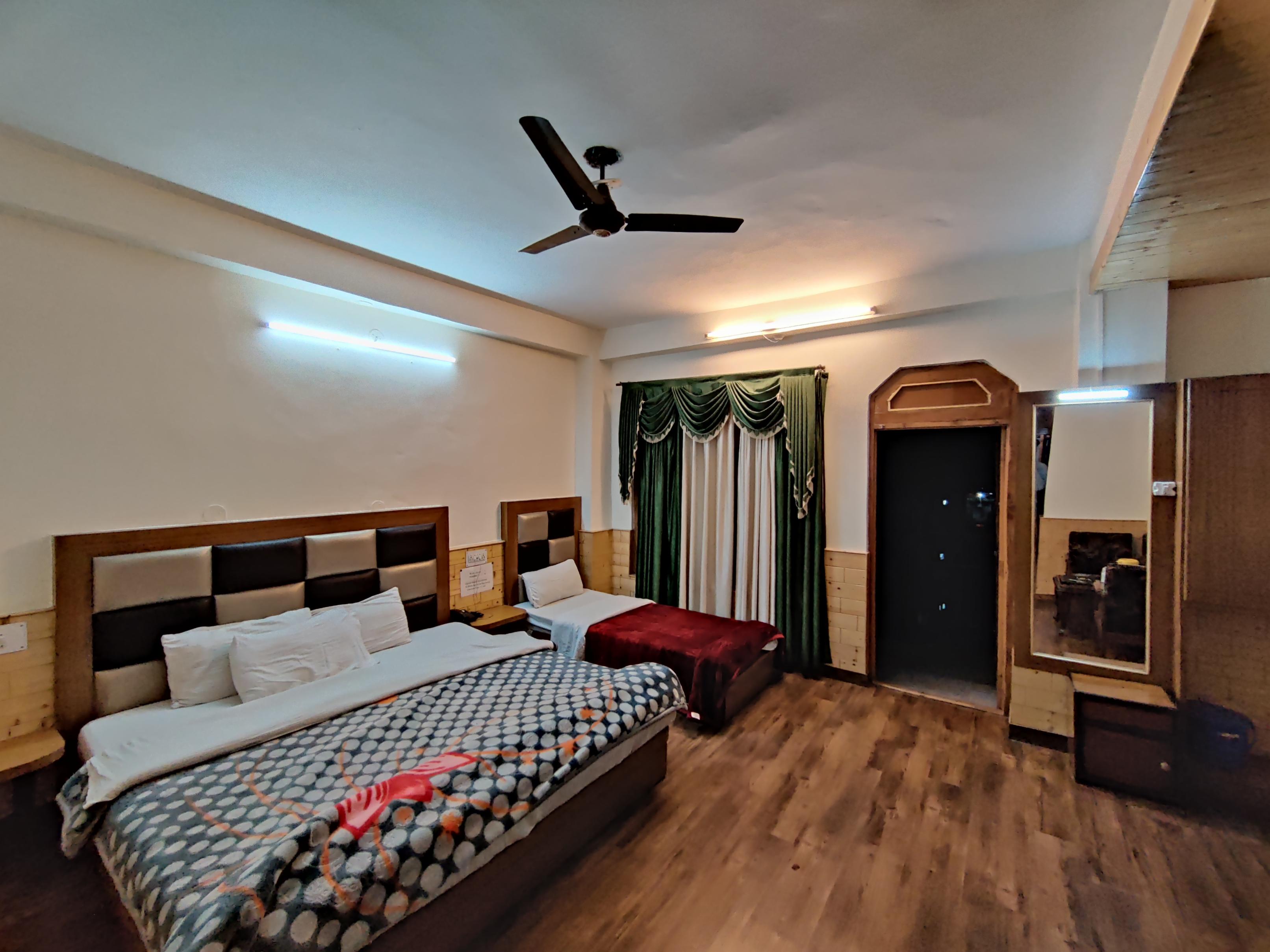 Shivalik Room Type - 3 Bedded room-River Facing, Mountain Facing