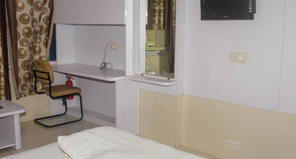 Hotel Krishna White House International Room Type - Deluxe AC Room
