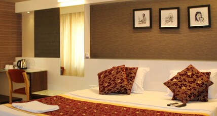 Pooja International Room Type - Prince Suite Room