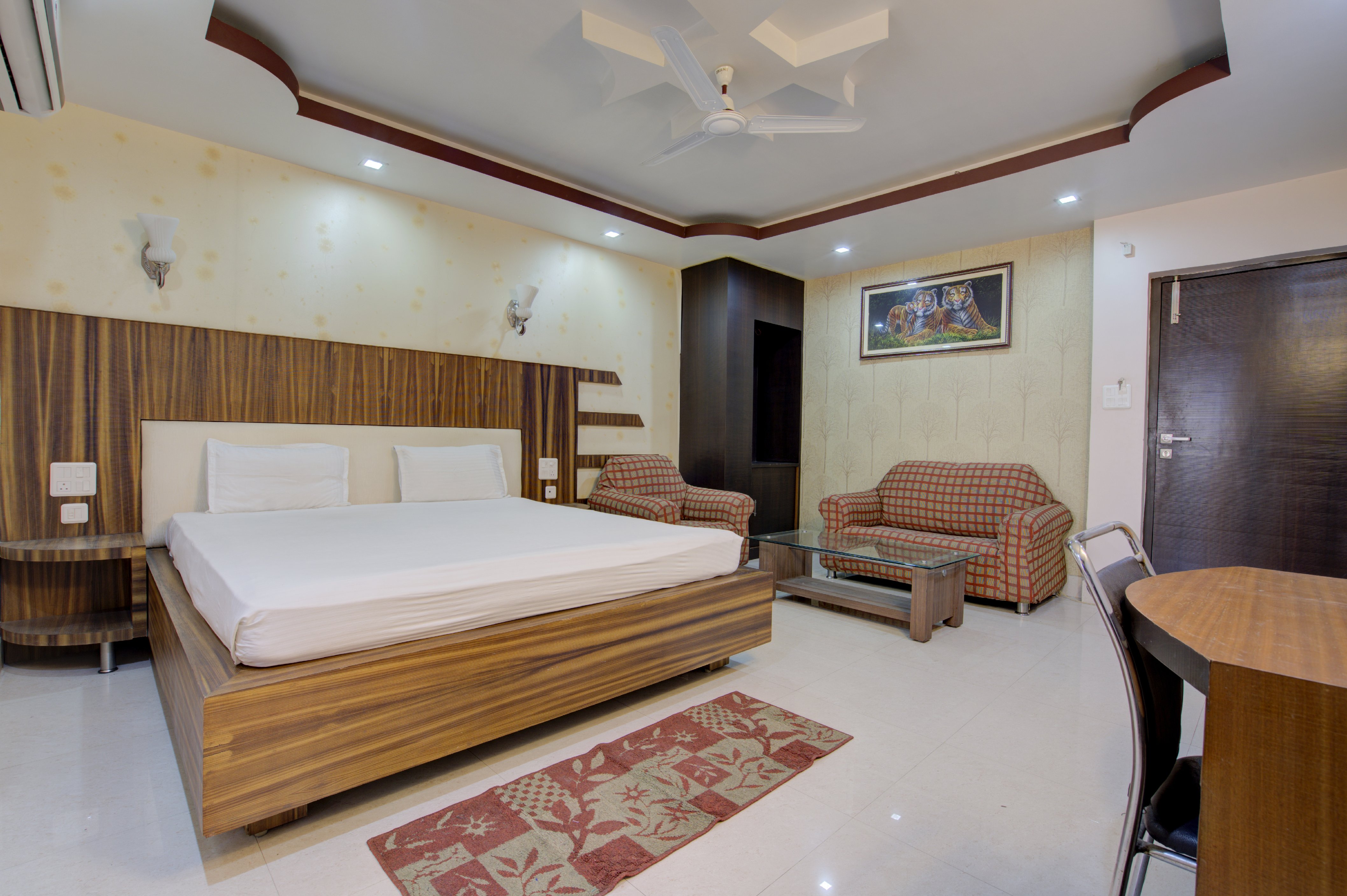 Hotel Om Regency - Tap to explore photos