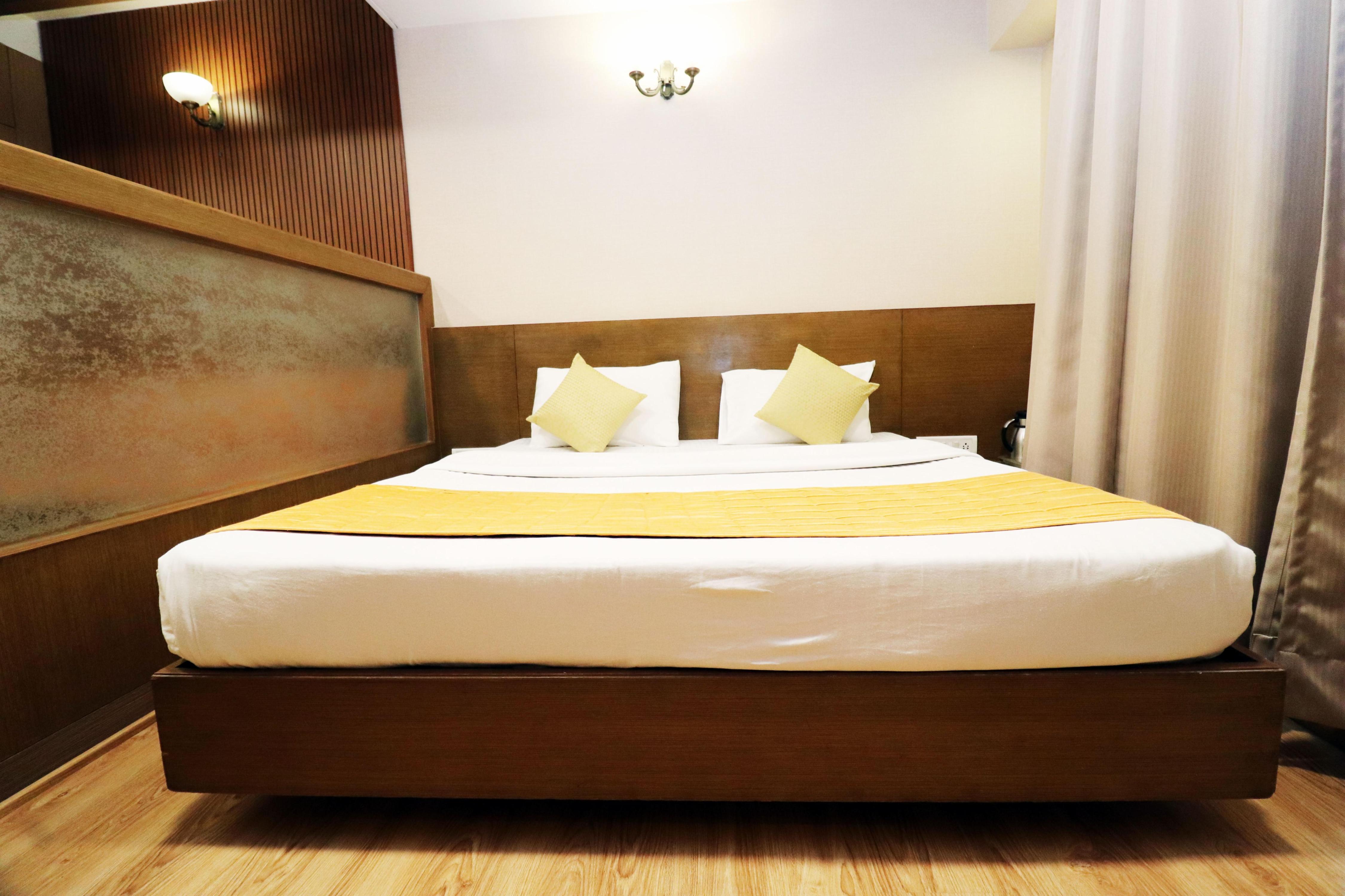 Hotel Rajhans Regent - Tap to explore photos