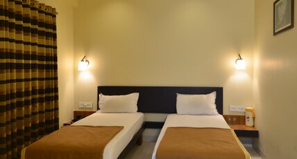 Hotel Tiranga Residency Room Type - Deluxe room