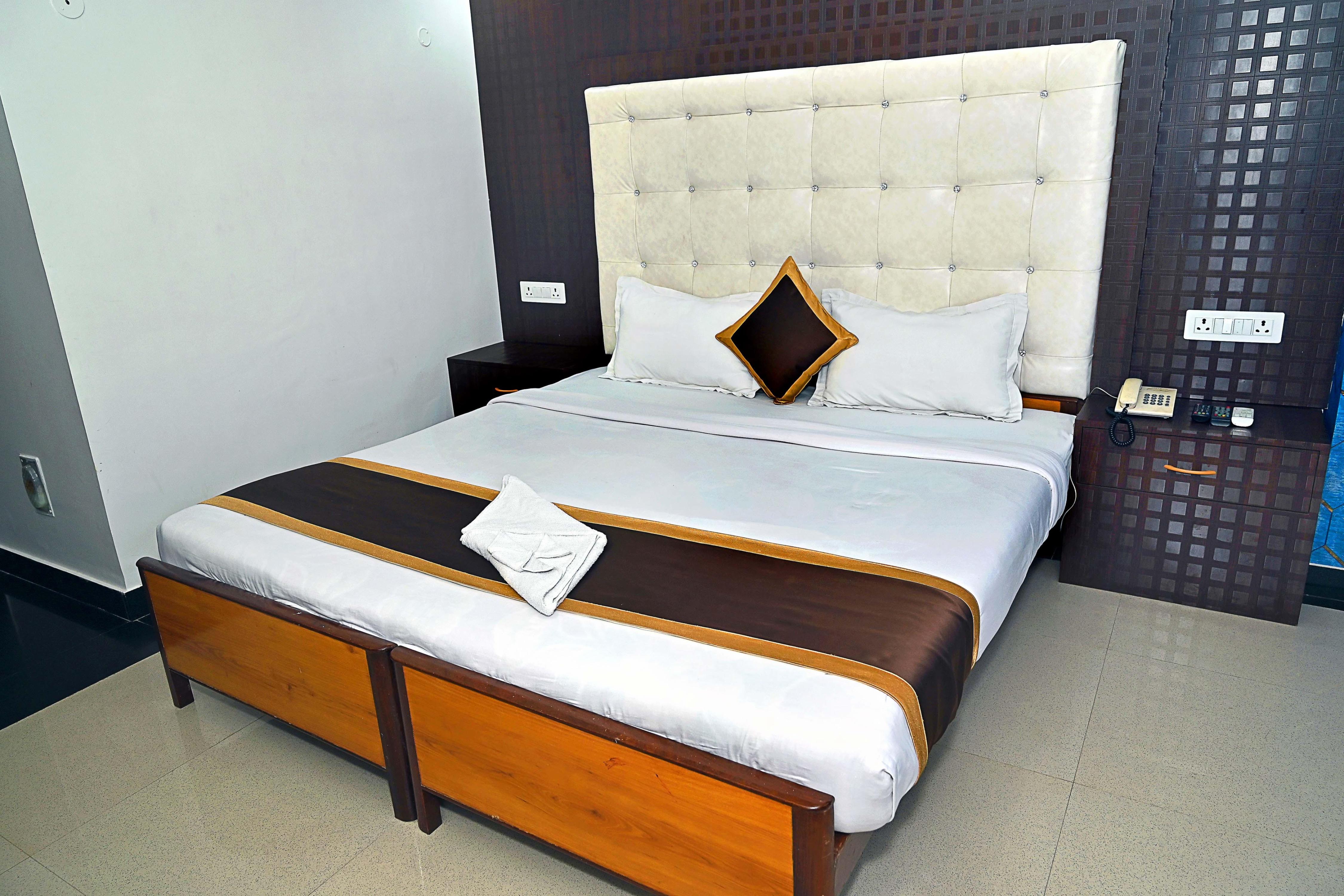 Hotel Rajhans International  - Tap to explore photos