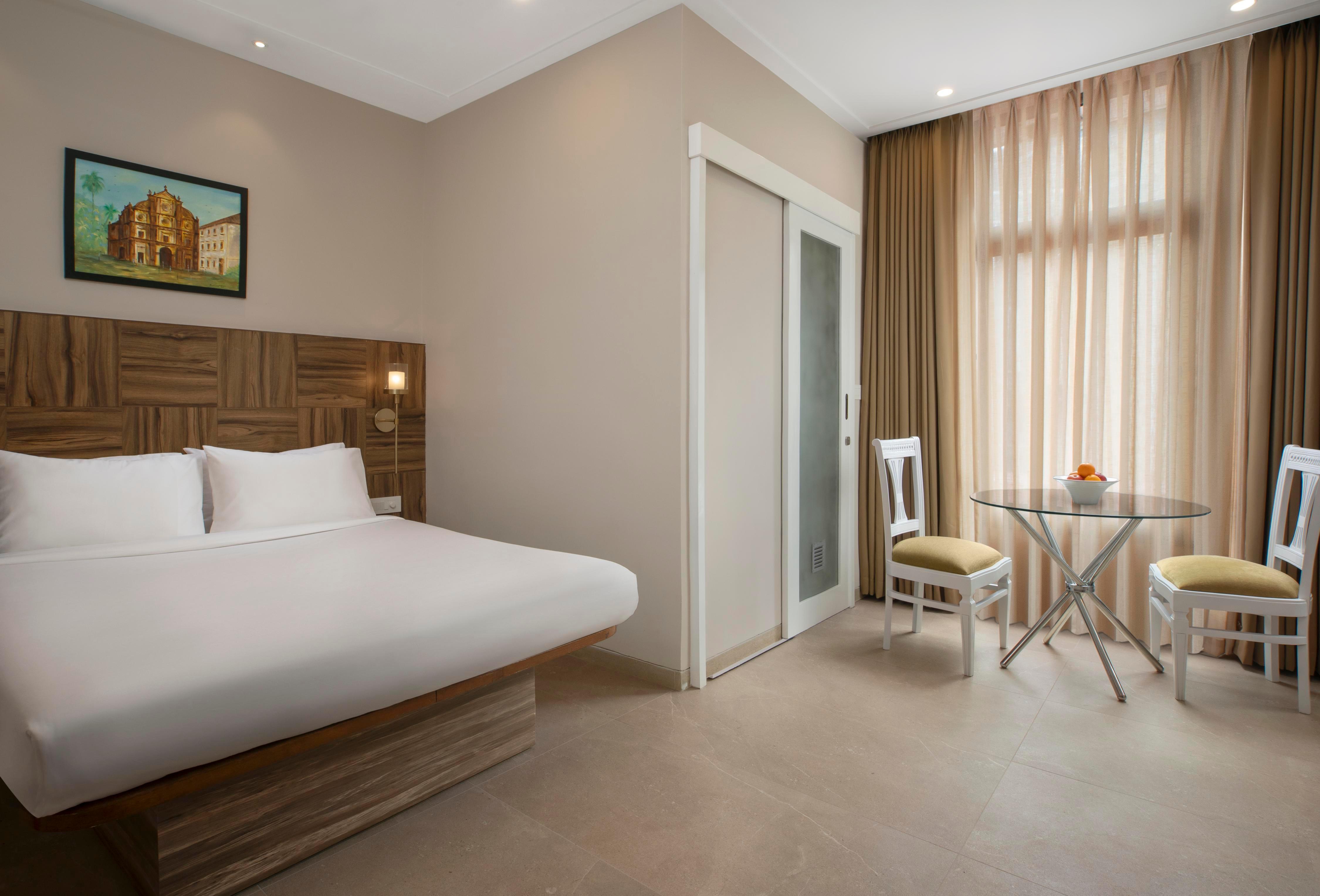 Hotel Rajdhani - Tap to explore photos