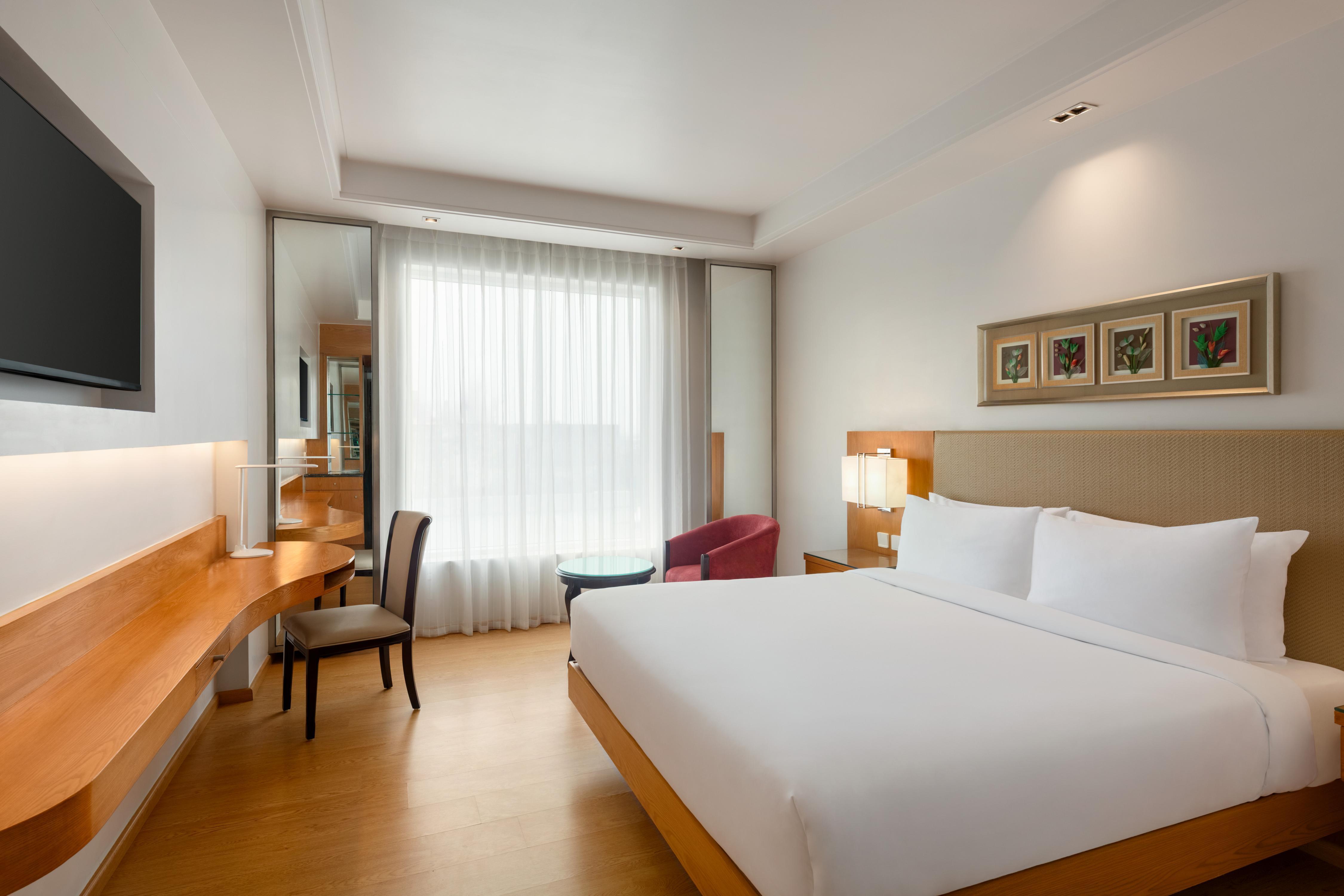 Ramada by Wyndham Ghaziabad Vasundhara - Tap to explore photos