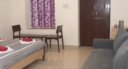 Girivihar Hotel Matheran Room Type - AC Super Deluxe Room with Sofa-cum-Bed